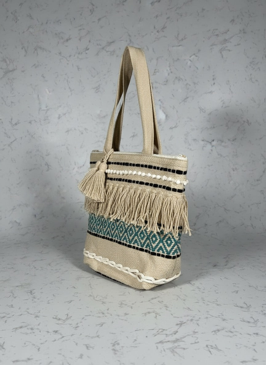 Handwoven Boho Jute Tote Bag with Fringe, Pom-Pom & Tribal Weave – Natural beige & Teal