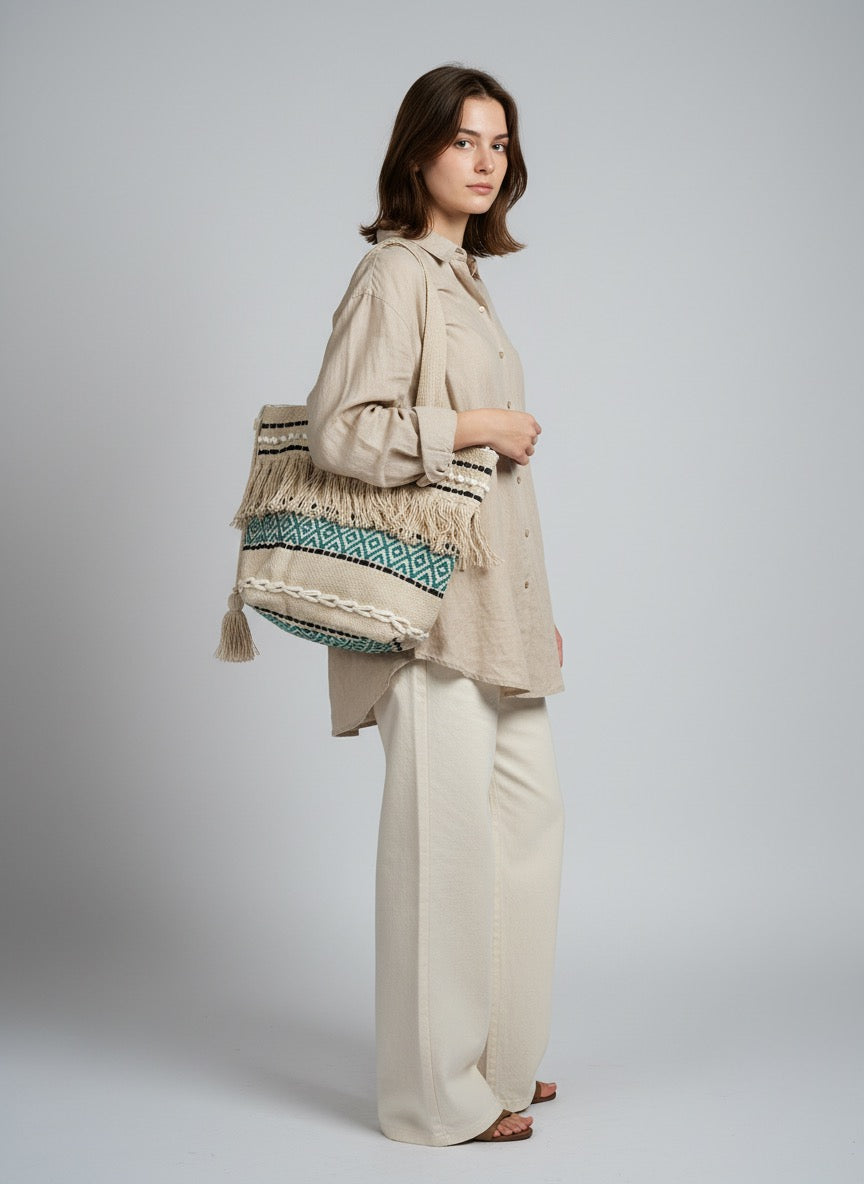 Handwoven Boho Jute Tote Bag with Fringe, Pom-Pom & Tribal Weave – Natural beige & Teal